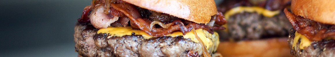 Eating Burger at Melt Gourmet Cheeseburgers restaurant in Leesburg, VA.
